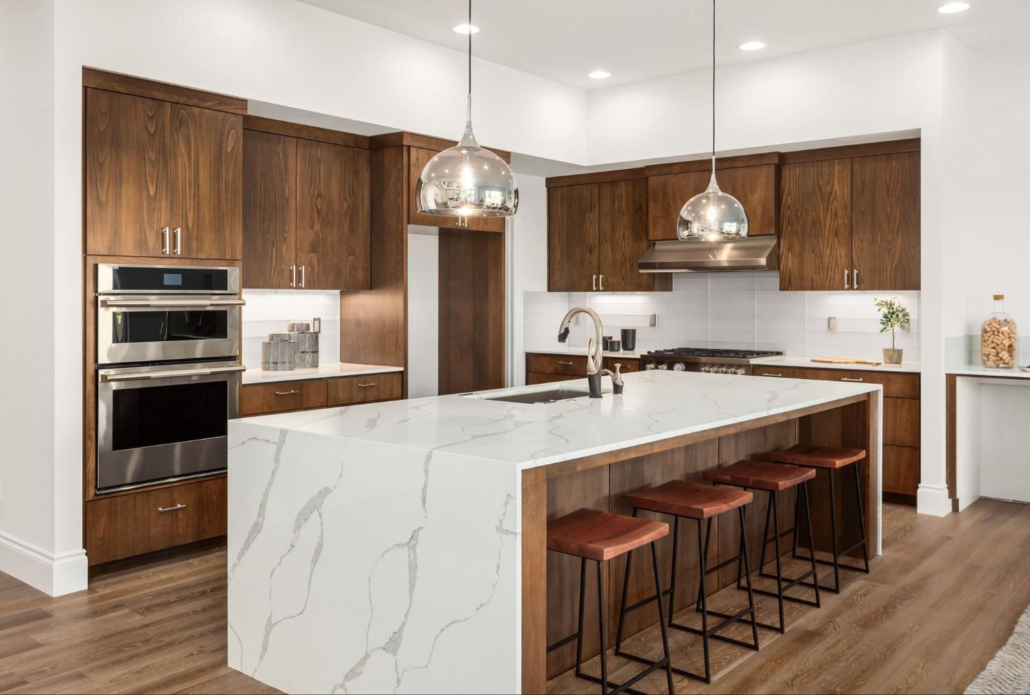 Big Island with Marble Countertop and Seating in a Modern Kitchen