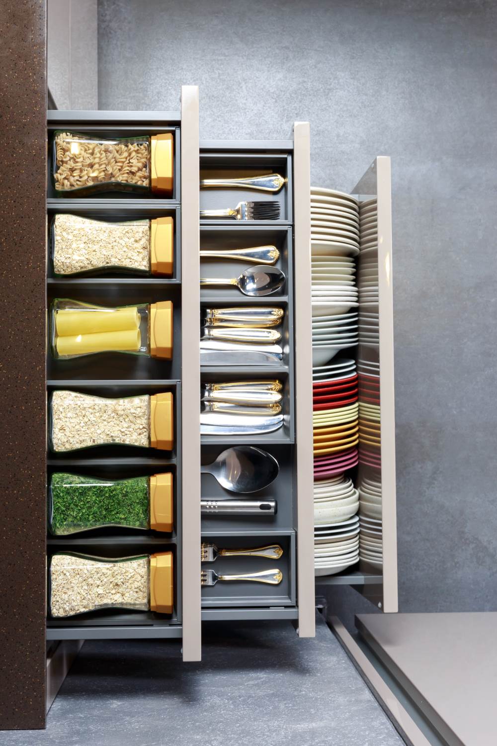 Organized Bottles and Classified Utensils in a Kitchen Drawer