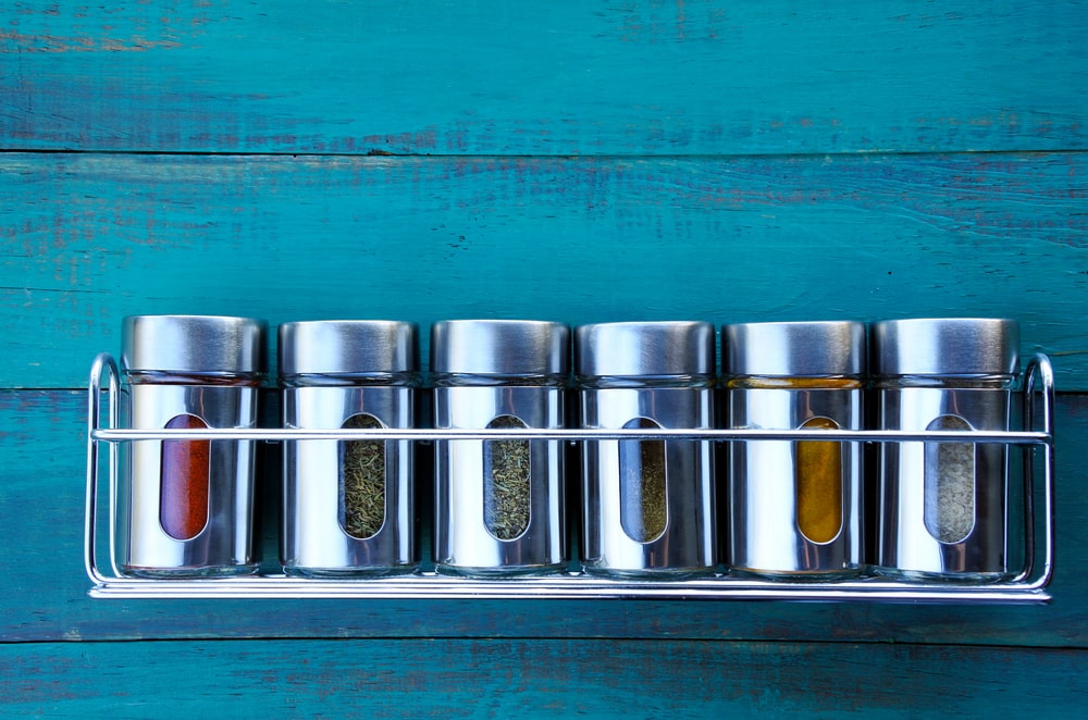 Spice rack on a wooden wall