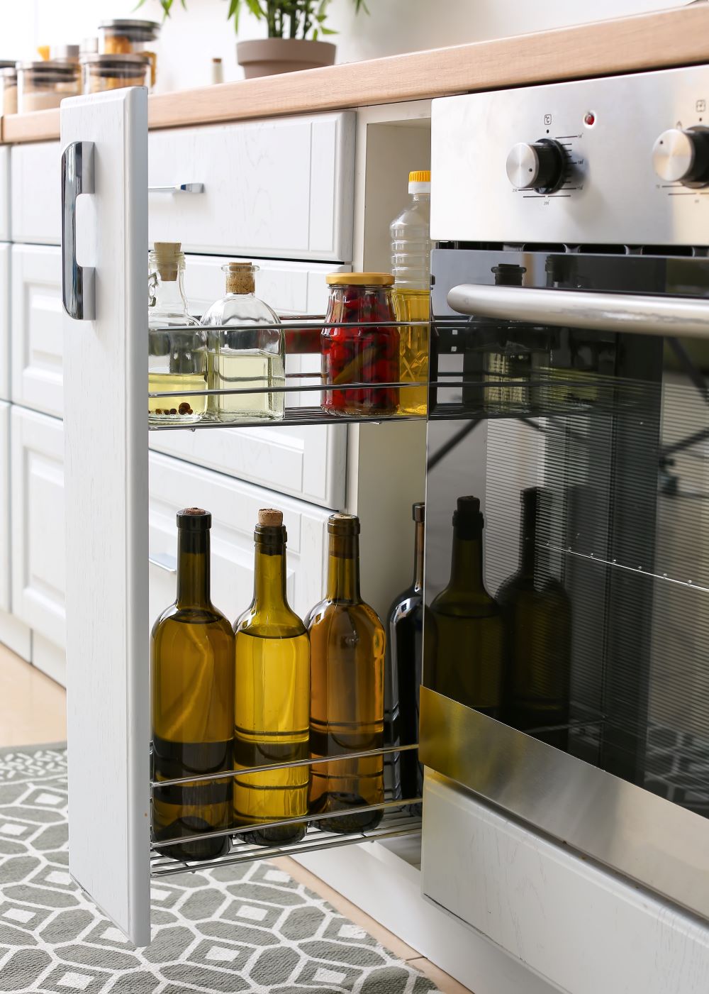 Vertical pull-out shelf with some bottles