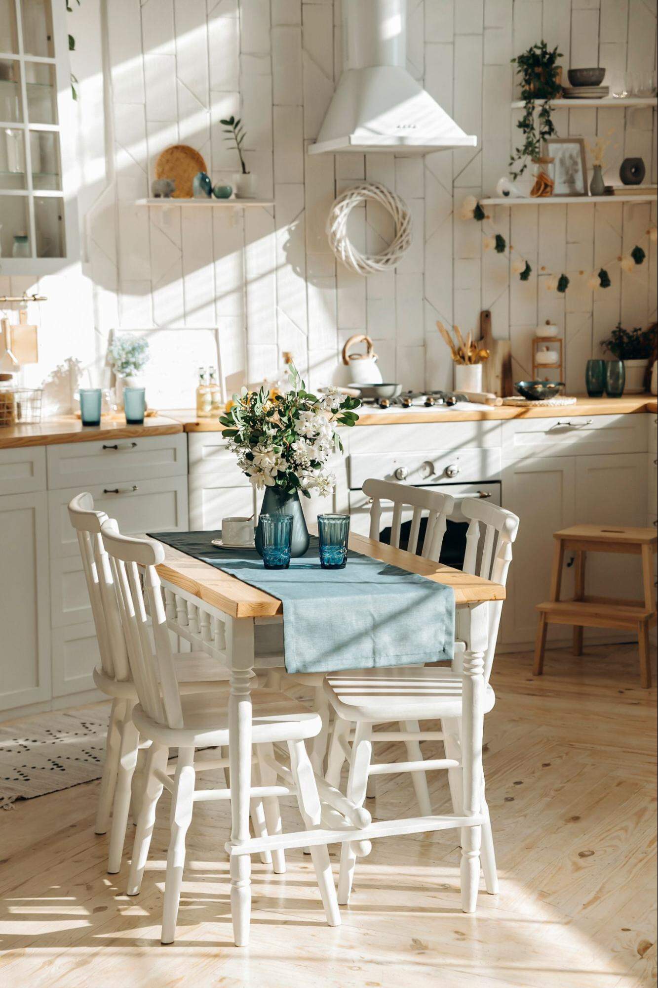 A Small Kitchen With A Dining Table 12
