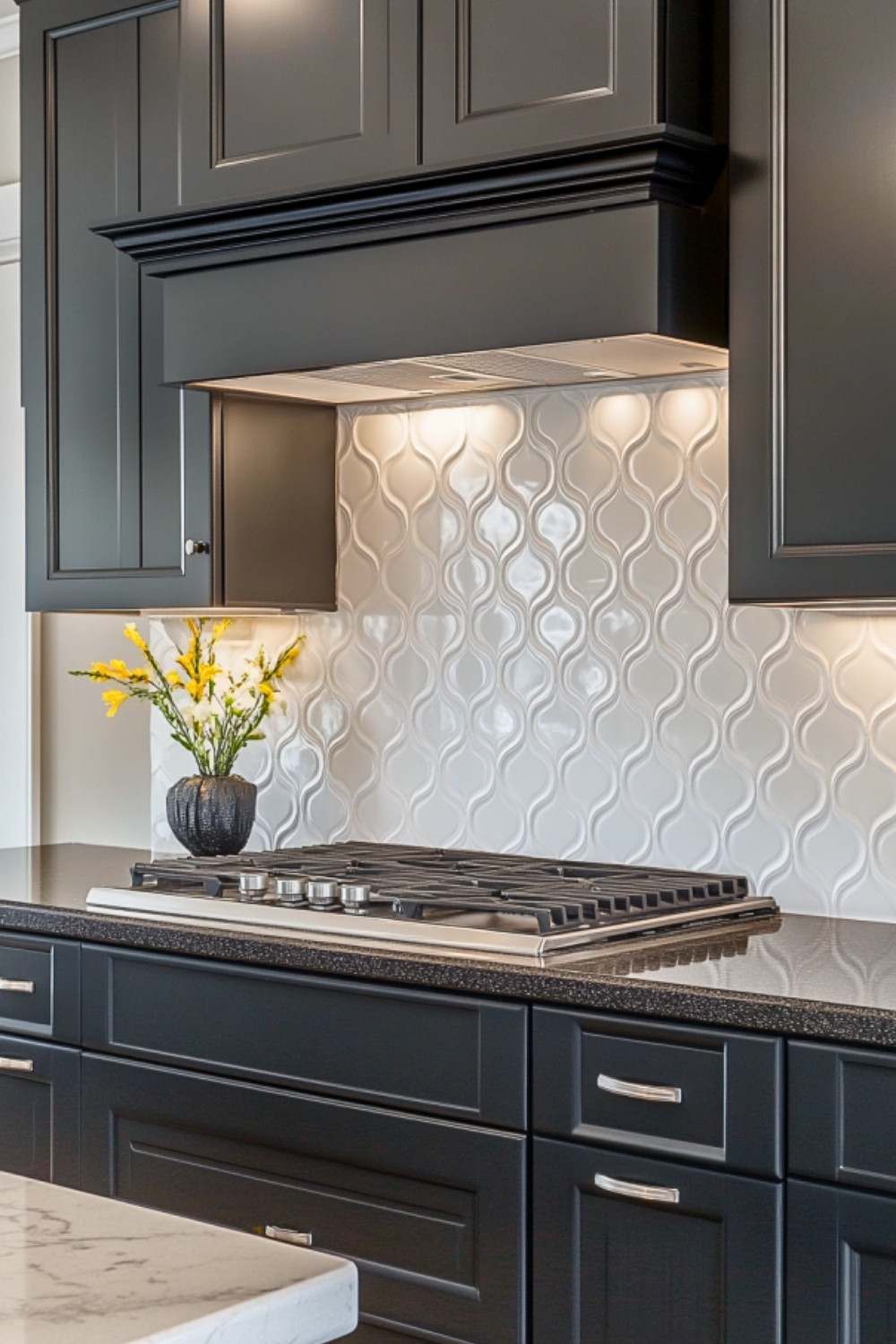 Classic Dark Kitchen with Glossy White Arabesque Tile Backsplash and Black Cabinetry
