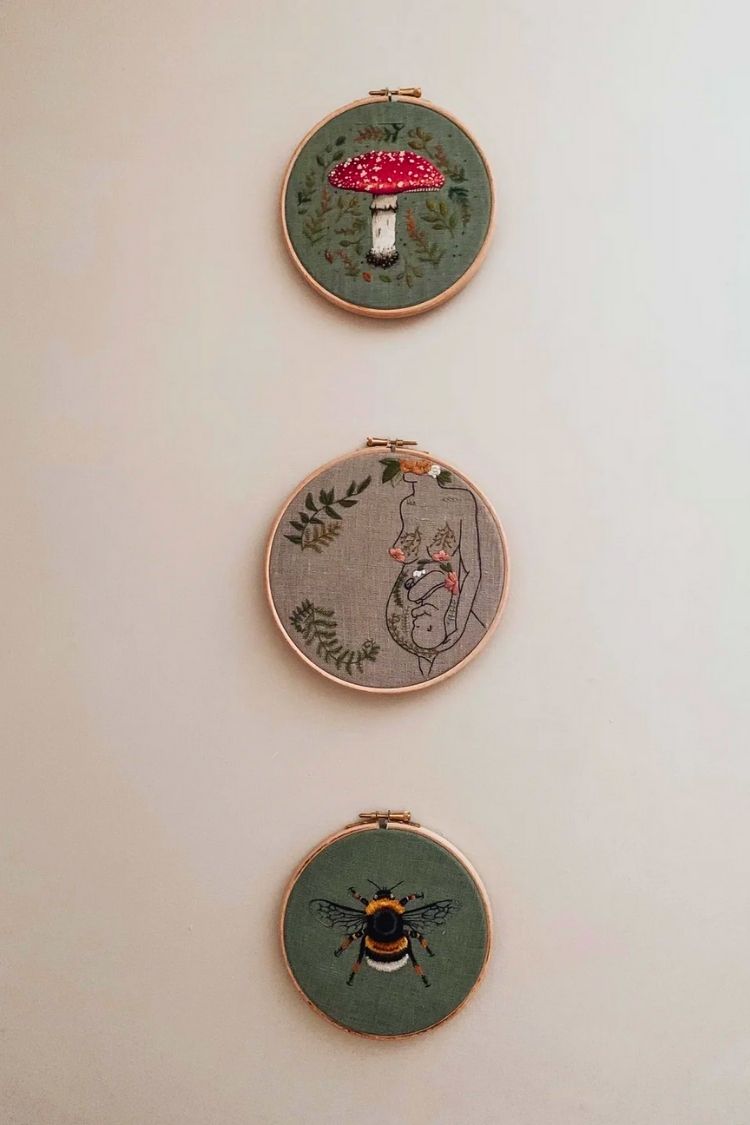 embroidery hoop wall art in gender neutral boho nursery