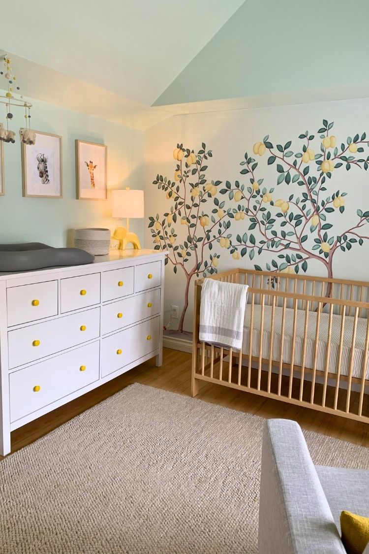 gender neutral boho nursery with lemon tree wallpaper