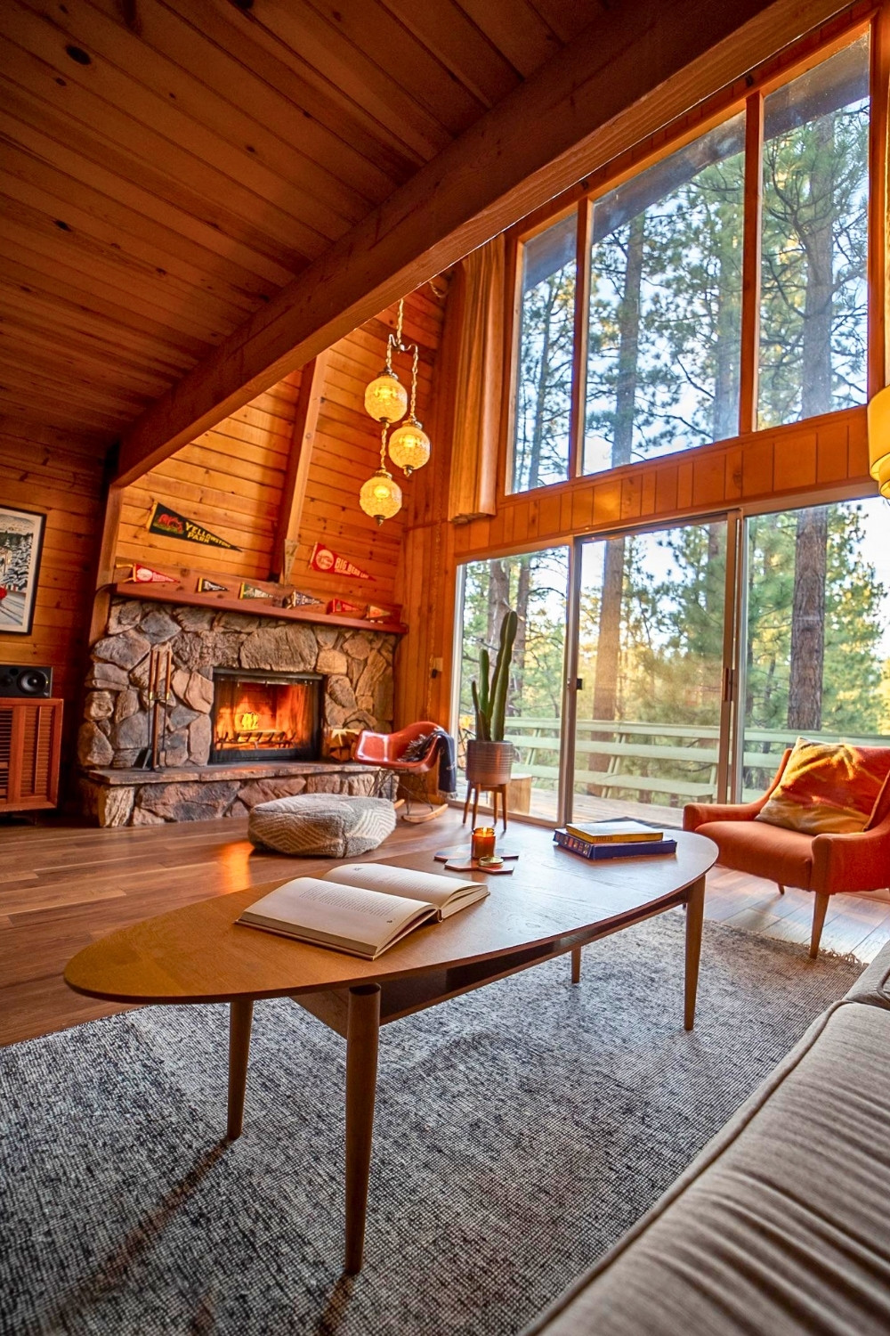 Mid-Century Oval Coffee Table in Warm Cabin Living Room
