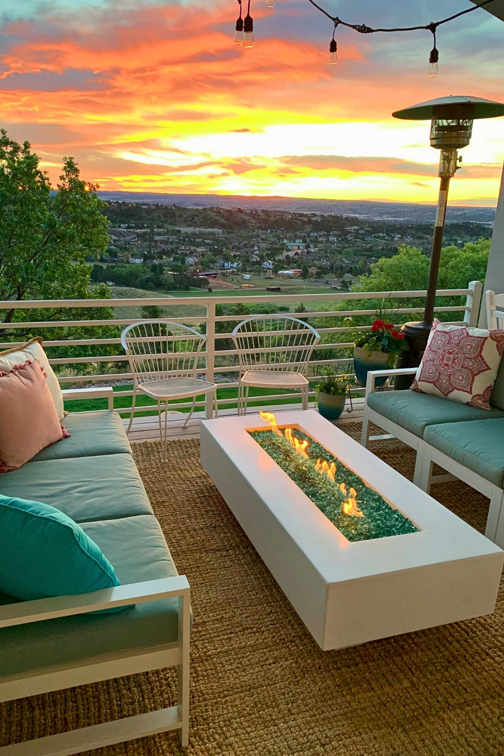 Modern Outdoor Coffee Table With Fire Pit and Pastel Cushions