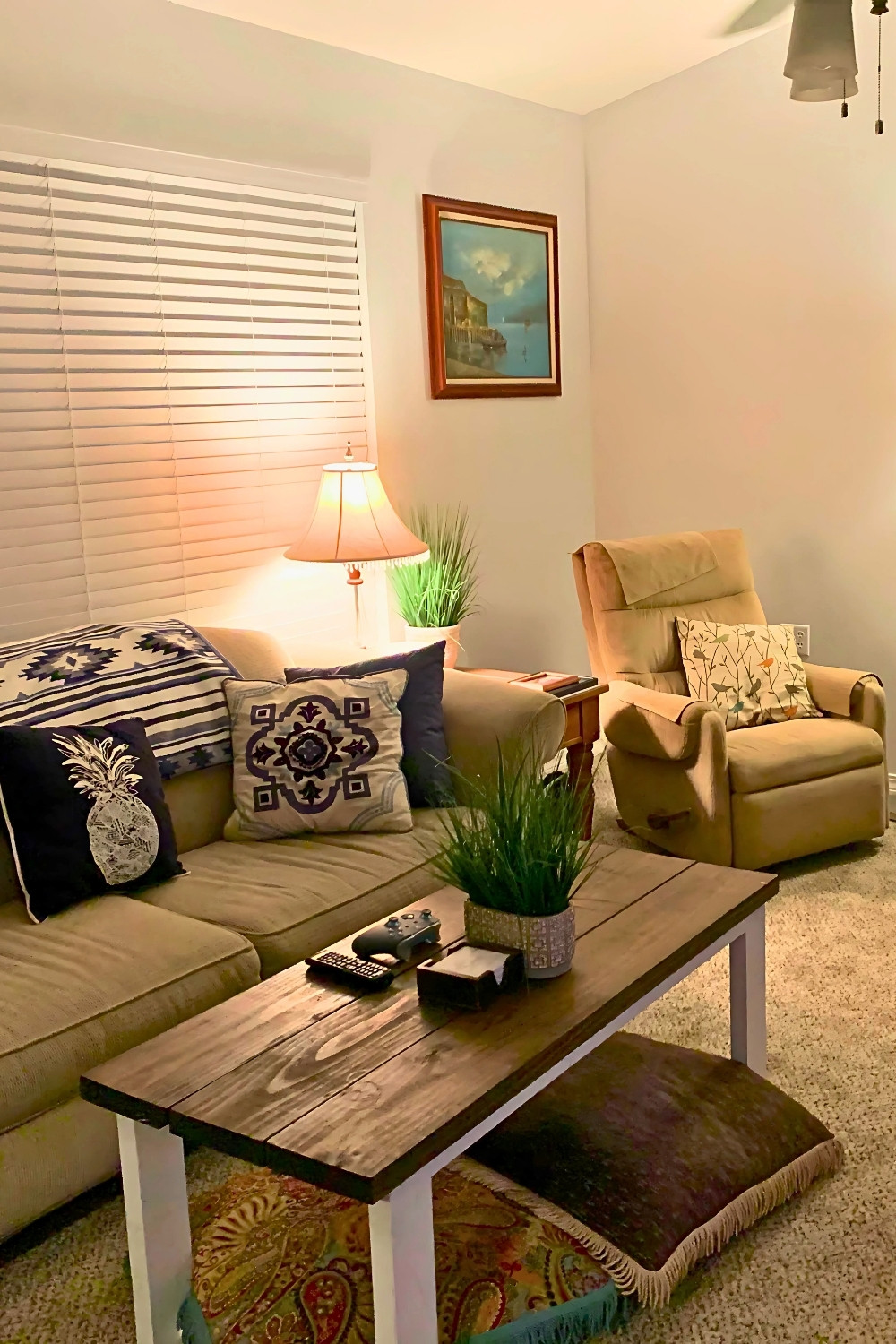 boho living room with handmade wood coffee table and throw pillows