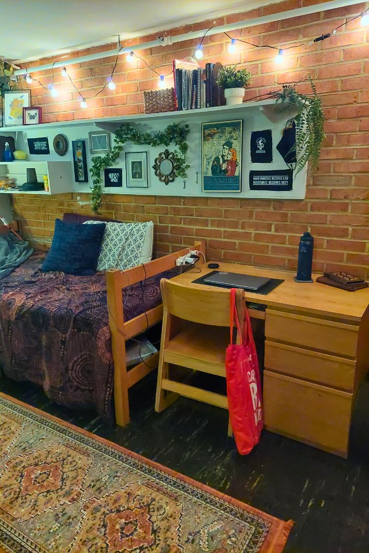 guy dorm room with brick wall