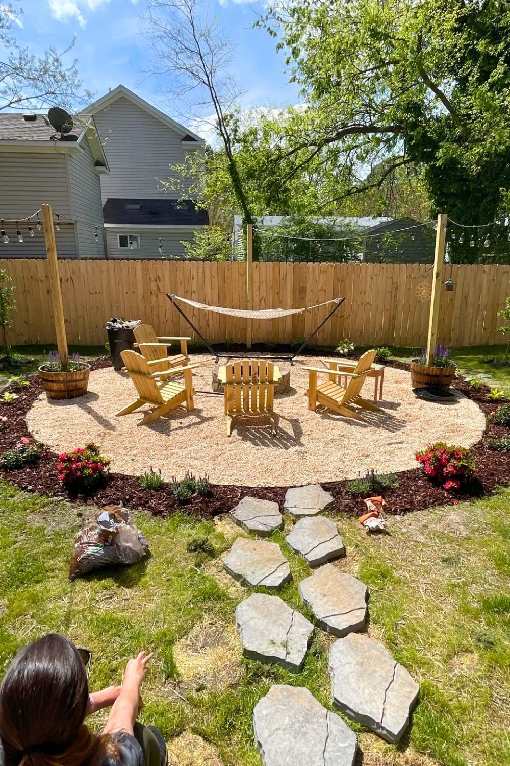 Backyard Circle With String Lights & Adirondacks
