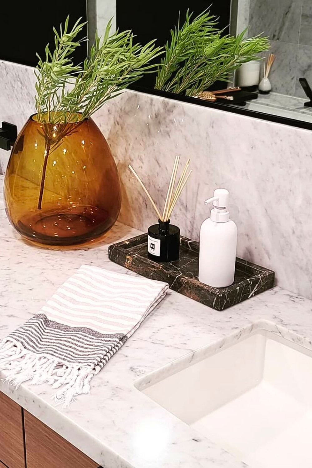 Chic Marble Tray with Amber Vase for a Fresh, Spa-Inspired Bathroom Look