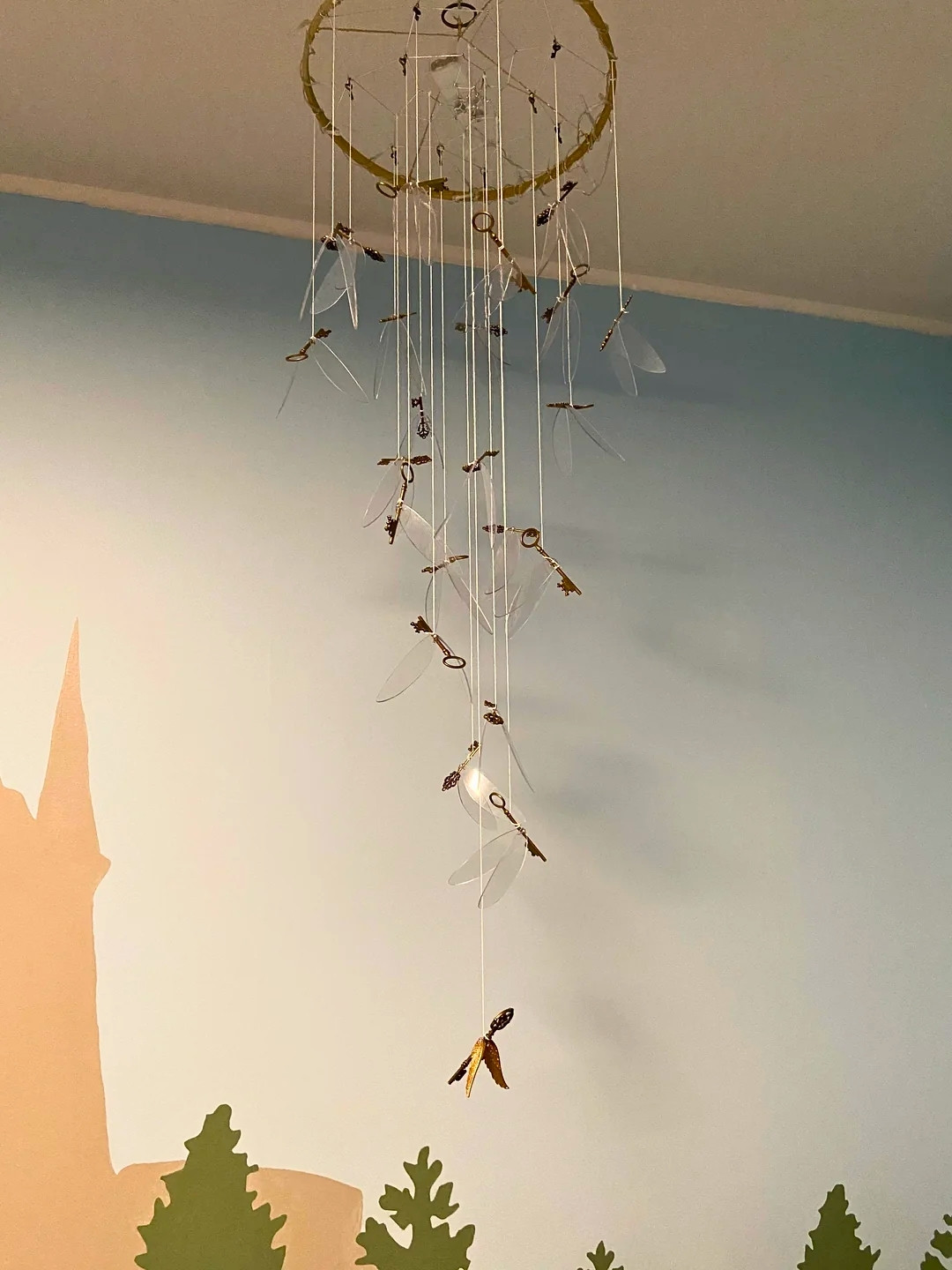 Whimsical DIY Harry Potter Nursery With Hogwarts Express Bookshelf and Mural