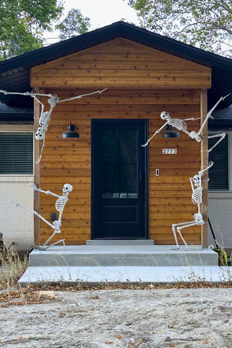 sexy skeletons in front porch for Halloween