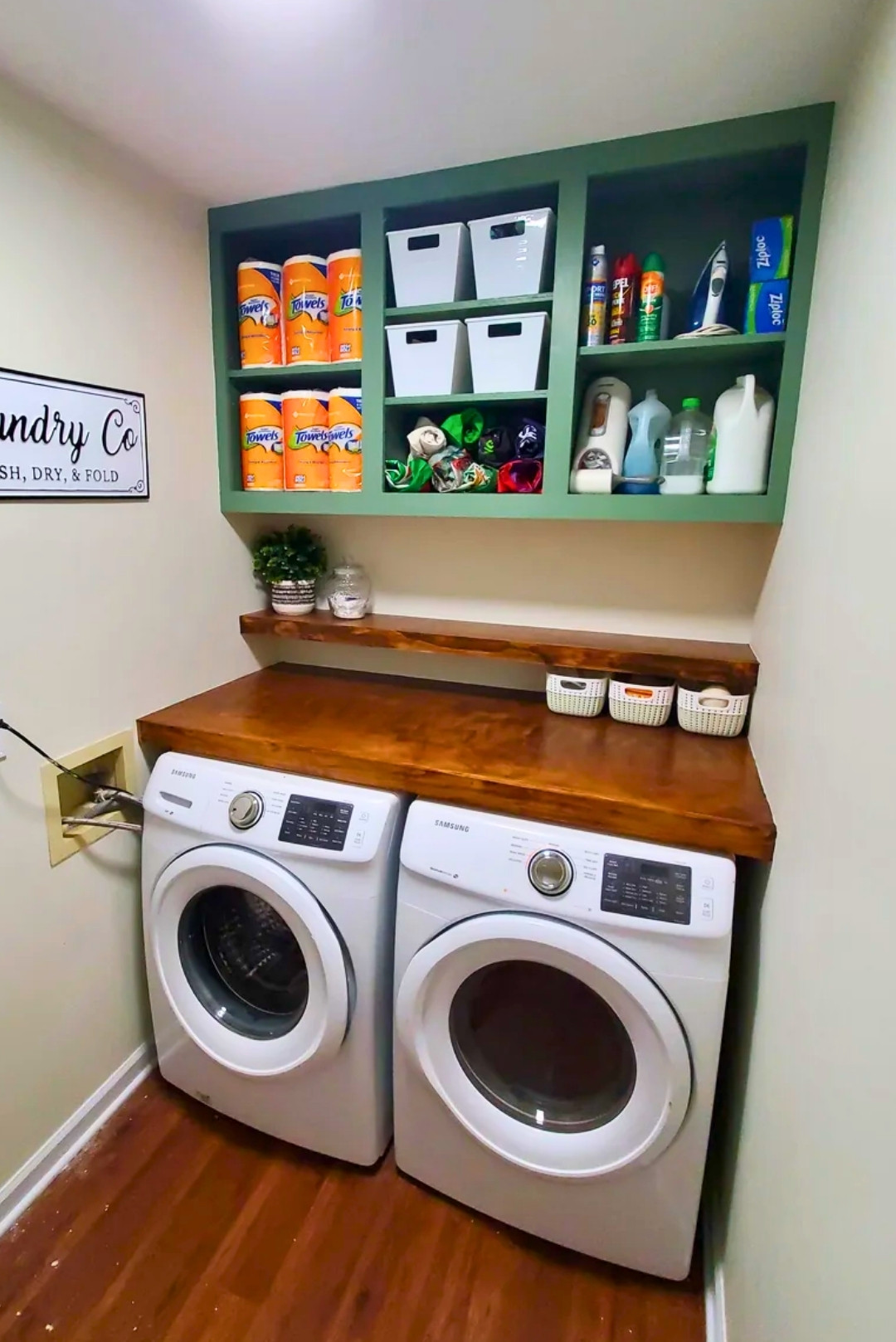 Built-In Green Cabinet with Cubbies & Countertop