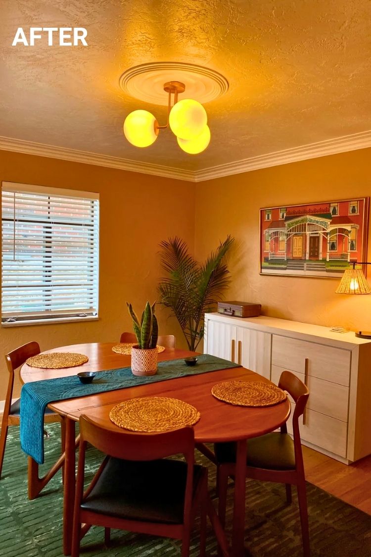 After – Cozy dining room with round table and warm lighting