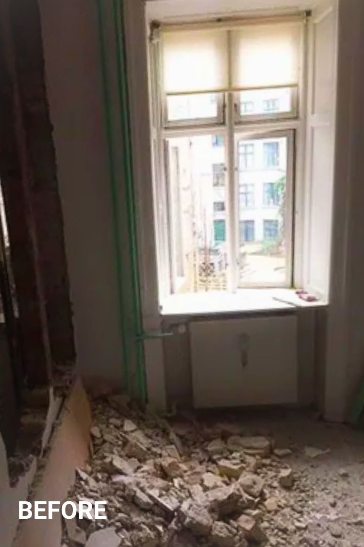 Before – Damaged room with debris and broken window