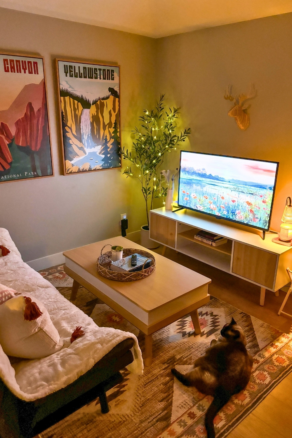 Cozy Neutral Living Room with National Park Prints and Hygge Vibes