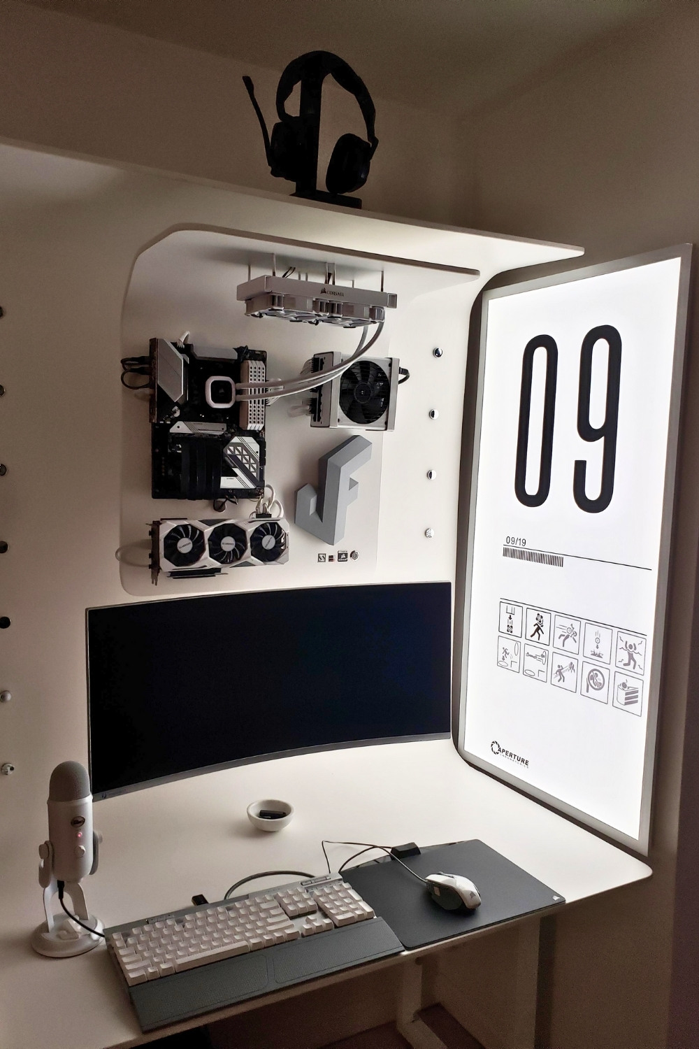 White Minimalist Portal-Inspired PC Setup With LED Wall Light