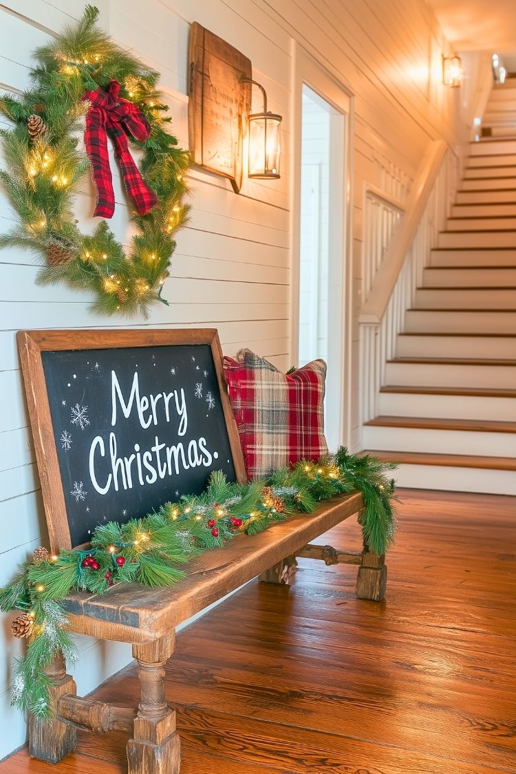 Cozy Farmhouse Entryway Bench With Merry Christmas Sign and Garland Accents