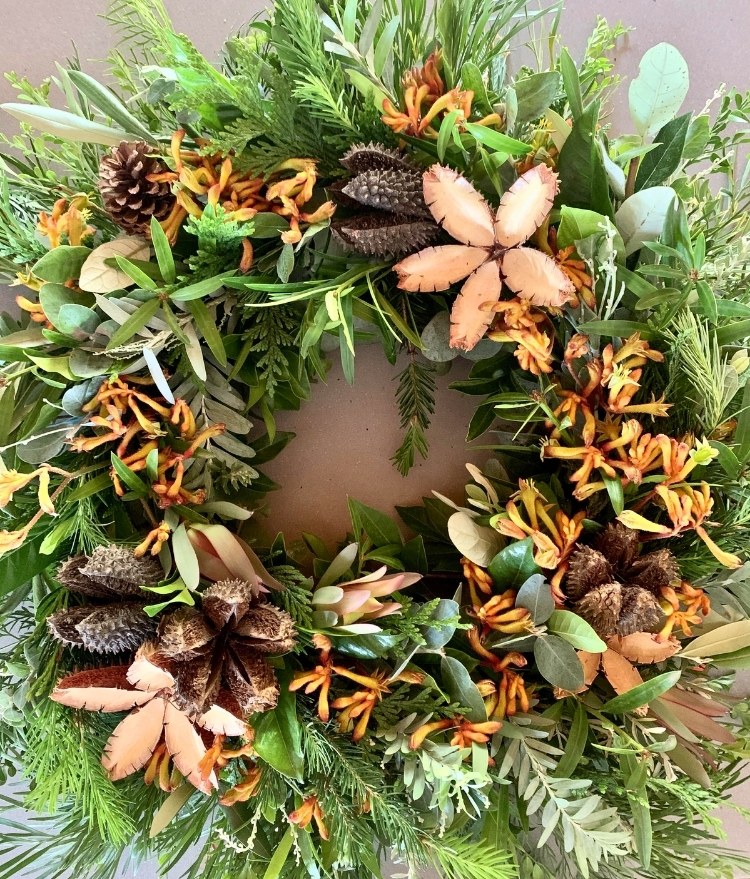 a diy christmas wreath on front door